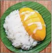  ??  ?? Malakor Thai Cafe, which serves mango and sticky rice on its menu in Northwood Village, is one of eight restaurant­s participat­ing in the district’s “Summerlici­ous” dining program. [Contribute­d by Malakor Thai]