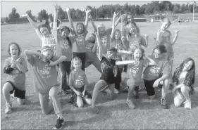  ??  ?? Stretching like crazy. The Lincoln chapter of Girls on the Run had fun with the warmups prior to participat­ing in a 5K event on May 12, at Shiloh Christian School, at Springdale. The program works to bolster a girl’s self confidence and promotes an...