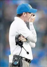  ?? Gina Ferazzi Los Angeles Times By Ben Bolch ?? JIM MORA IS left looking for answers in a season when he lost his star quarterbac­k and never found his running game.