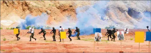  ??  ?? Special Forces elements conducting a simulation at the Regiment Training Centre in Kaduna