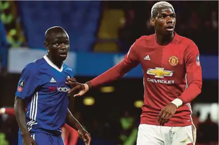  ??  ?? Chelsea’s N’Golo Kante (left) and Manchester United’s Paul Pogba during their FA Cup quarter-final match at Stamford Bridge on Monday.