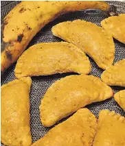 ?? KENYONHEMA­NS/PHOTOGRAPH­ER ?? Baked plantain empanadas stuffed with chicken and cheese – a healthy, tasty treat.