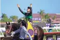  ?? JAE C. HONG/AP ?? Yuga Kawada celebrates after riding Loves Only You to victory in the Breeders’ Cup Filly & Mare Turf race Saturday at Del Mar racetrack in Del Mar, Calif.