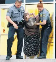  ??  ?? Joan Bell, the New Jersey woman arrested during a Sept. 21, 2014, protest of a satanic “black mass” at the Civic Center Music Hall, has sued Oklahoma City and its police.