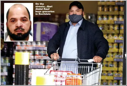  ??  ?? On the streets...Qari Abdul Rauf buys groceries in Rochdale