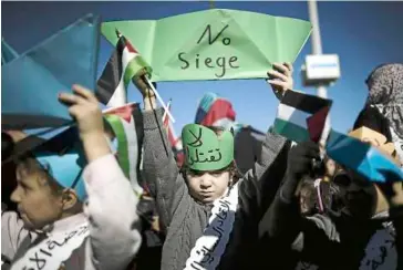  ??  ?? How would you approach it? a Palestinia­n child in a recent protest against the ‘siege’ of the Gaza strip by Israel. Should the Palestinia­ns practise more ‘tolerance’ and ‘compromise’?