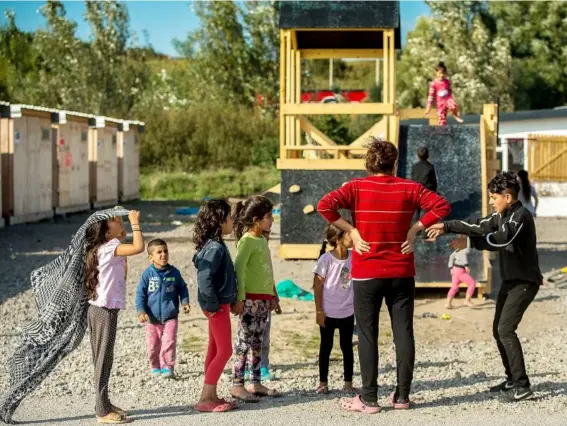  ??  ?? Children from Syria at the Grande-Synthe camp near Dunkirk (Getty)