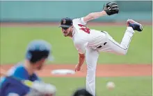  ?? CHARLES KRUPA THE ASSOCIATED PRESS ?? Red Sox starting pitcher Chris Sale improved to 4-9 on the season with six shutout innings of two-hit ball while striking out 12 on Thursday.