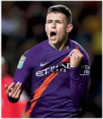  ??  ?? City fan…Foden celebrates scoring his first senior goal in a Carabao Cup clash with Oxford United