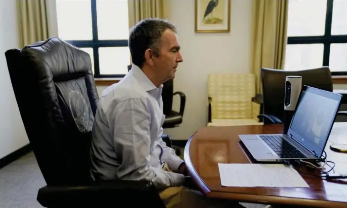  ??  ?? Virginia Governor Ralph Northam: ‘We don’t even have enough swabs. For the national level to say that we have what we need, and really to have no guidance to the state levels, is just irresponsi­ble.’ Photograph: Jack Mayer/AP