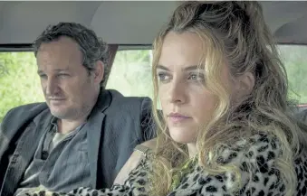  ?? Photos by Glen Wilson, ?? Jason Clarke, left, and Riley Keough in a scene from “The Devil All The Time.” Netflix