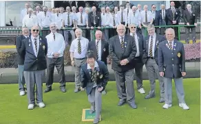  ??  ?? At Kirriemuir’s opening day, Wilma Burness rolled the first jack watched by, from left, Peter Clyne, David Soutar and Bill Burness.