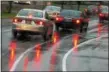  ??  ?? The automotive resource AAA advises that wet pavement contribute­s to nearly 1.2 million traffic accidents each year.