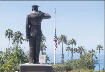  ?? PAUL BERSEBACH — THE ORANGE COUNTY REGISTER VIA AP, FILE ?? The U.S. flag was lowered to half-staff at Park Semper Fi in San Clemente on Friday, July 31, 2020.