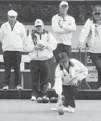  ??  ?? Left: All eyes are on Drouin’s Ray Wageningen in the division three match against Warragul.
Far left: Warragul’s Lindsay Matthews helps the bowls on its way in the division three match against Drouin.