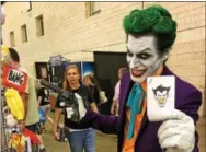  ?? ERIC DEVLIN — DIGITAL FIRST MEDIA ?? This cosplayer dressed as The Joker from Batman during the Wizard Wold Comic Con in Philadelph­ia Saturday.