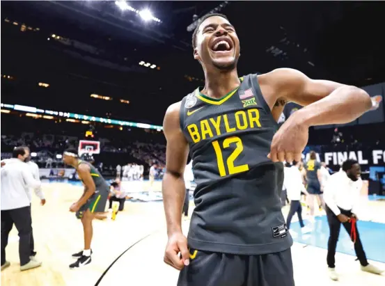  ?? GETTY IMAGES ?? Guard Jared Butler celebrates after scoring 22 points to lead Baylor to the NCAA title Monday in Indianapol­is. He was named the most outstandin­g player of the Final Four.