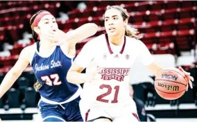  ??  ?? Mississipp­i State’s Madison Hayes (21) drives to the basket against Jackson State. (Photo by Austin Perryman, MSU Athletics, SDN file)