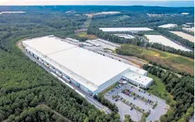  ??  ?? Americold owns this cold-storage facility in Atlanta. Companies are seeking to build, buy or invest in the cold storage industry as consumers fill their freezers in the pandemic.