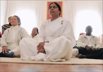  ?? PICTURE: IHSAAN HAFFEJEE ?? Devotees at Ekukhanyen­i Meditation Centre in Diepkloof, Soweto. As people report feeling more stressed, interest in mindfulnes­s meditation, adult colouring and other calming techniques grows. More people are turning to spiritual retreats as a way to...