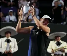  ?? /AP. ?? La polaca Iga Swiatek es la más reciente campeona de las Finales WTA, tras coronarse en Cancún, México.