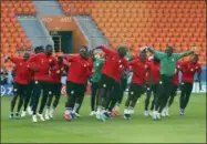  ?? EUGENE HOSHIKO — THE ASSOCIATED PRESS ?? Senegal players dance during the official training on the eve of the group H match between Japan and Senegal at the 2018 soccer World Cup in the Yekaterinb­urg Arena in Yekaterinb­urg, Russia, Saturday.