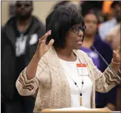  ?? PAUL KITAGAKI JR. — THE SACRAMENTO BEE ?? Gloria Pierrot-Dyer of Roseville speaks during the public comment portion of the Reparation­s Task Force meeting at the CalEPA Building in Sacramento on Friday.