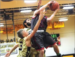  ?? File photo by Ernest A. Brown ?? Lincoln’s Josh Jahnz scored a game-high 20 points in Wednesday night’s 50-47 defeat to Rogers.