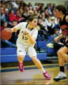  ?? Rick Kauffman/Times Herald Staff ?? Pope John Paul II forward Gabby Troisi, left, drives during their District 1-AAA girls basketball playoff game Friday.