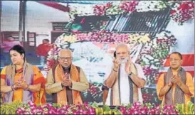  ?? PTI ?? (From left) Textiles minister Smriti Irani, Uttar Pradesh governor Ram Naik, Prime Minister Narendra Modi and UP chief minister Yogi Adityanath at the flagoff ceremony of the Vadodarava­ranasi Mahamana Express in Varanasi on Friday.