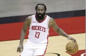  ?? AP file photo ?? Houston Rockets’ James Harden controls the ball during the first half against the Spurs in Houston on Dec. 17.