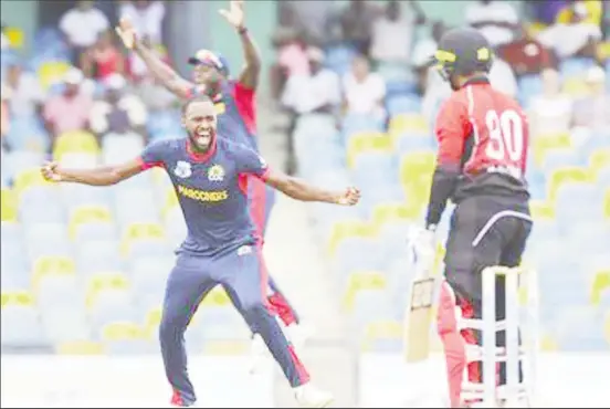  ??  ?? Combined Campuses and Colleges Marooners’ fast-bowler Akeem Jordan, left, celebrates the dismissal of Trinidad and Tobago Red Force skipper Denesh Ramdin during the second Super50 Cup semifinal at Kensington Oval, Barbados, yesterday. — Photo: CWI Media