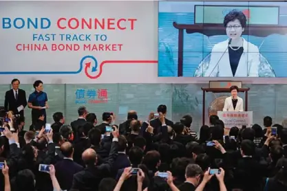  ??  ?? HONG KONG: Hong Kong’s new Chief Executive Carrie Lam speaks during the Bond Connect launching ceremony in Hong Kong. —AP