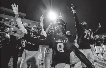  ?? William Luther/staff photograph­er ?? Brennan’s Ashton Dubose (8) leads the cheers after leading the way on the field by accounting for five touchdowns against Austin Lake Travis. This week the task is three-time defending state champ Austin Westlake.