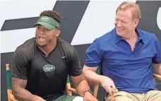  ?? SETH WENIG, AP ?? “If I had a perfect place to die, I would die on the field,” said the Jets’ Jamal Adams, left, with Commission­er Roger Goodell.