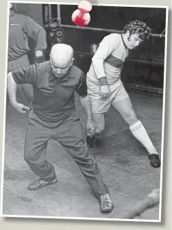  ??  ?? Joe Aitchison puts Dixie Deans through his paces with a series of exercises designed to improve mobility