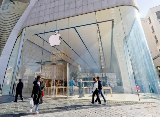  ?? MENG DINGBO/XINHUA ?? EU takes a bite The European Union slapped tech giant Apple with over 1.8 billion euros (about $1.95 billion) in fines for alleged antitrust violations. An Apple Store in Brussels, Belgium is shown.