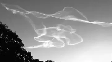  ??  ?? Smoke trails made by an Epsilon rocket are seen during the morning sunrise over Kimotsuki town in Kagoshima. — AFP photo