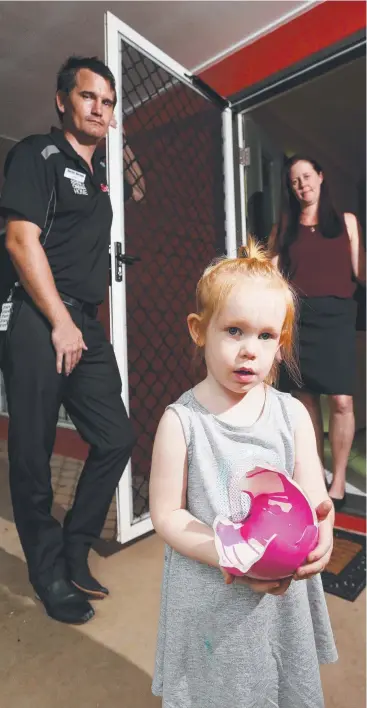  ?? Picture: STEWART McLEAN ?? SHATTERED: Michael Douglas and Lisa Smith with their three-year-old daughter, Charlotte Douglas, showing what’s left of her piggy bank after thieves broke in to their Roberts Rd home and stole about $2000 in cash.