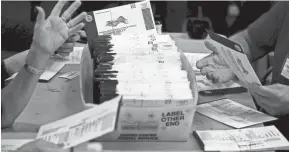  ?? MATT SLOCUM/AP ?? Out of 20 packages sent by the USA TODAY Network the week of Election Day in six states, not one took more than three days to reach its destinatio­n – the U.S. Postal Service’s benchmark for local mail.