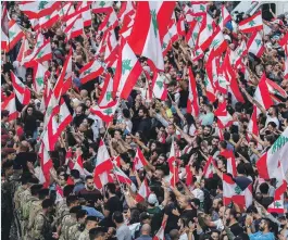  ?? AFP ?? For the first time in years, Lebanese people have set aside their difference­s