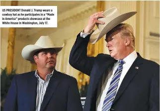  ??  ?? US PRESIDENT Donald J. Trump wears a cowboy hat as he participat­es in a “Made in America” products showcase at the White House in Washington, July 17.