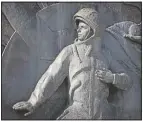  ?? (AP/Alexander Zemlianich­enko) ?? The bas-relief of Gagarin as part of a 351-feet high titanium obelisk depicting a starting rocket dedicated to the first cosmonauts opened in Moscow 1964 in Moscow.