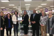  ?? SUBMITTED PHOTO ?? Gordmans presented with a plaque from the Oneida Chamber of Commerce.