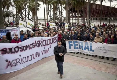  ??  ?? Unhappy lot: Farmers in Almeria demonstrat­ing against the low prices offered for their fruits and vegetables. — AFP