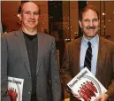  ??  ?? Kennedy Space Center’s Scott Vangen, left, and astronaut John Mace Grunfeld attend the 2010 premiere of the symphony’s “The Planets.”