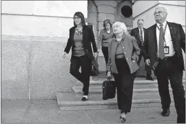  ?? [JACQUELYN MARTIN/ THE ASSOCIATED PRESS] ?? Federal Reserve Chair Janet Yellen, center, leaves the Longworth House Office Building after testifying at a hearing of the Federal Reserve Board Joint Economic Committee on Wednesday. It likely will be her last appearance on Capitol Hill in Washington.