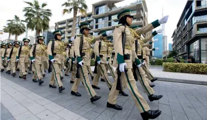  ?? Photo by Leslie Pableo ?? The Dubai Police’s new corporate identity parade at City Walk. To raise awareness of its new emblem, the force will organise various events in different parts of the city, including commercial centres and public places . —