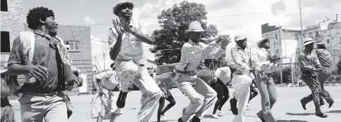  ??  ?? Internatio­nally acclaimed dance group Inkululeko Yabatsha School of Arts (Iyasa) performs at a ceremony held at Famona Fire Station in Bulawayo last Thursday.