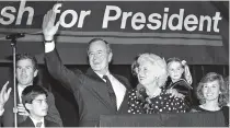  ?? AP FILE PHOTO ?? Then-Vice President George H.W. Bush, with his wife, Barbara, announces his candidacy for the presidency in 1987.